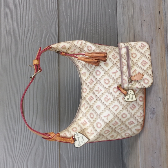 Dooney & Bourke Handbags - ❌️🚫 SOLD! Dooney & Bourke Vintage Coated Cotton Crossword Bucket Bag & Wallet